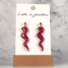 dangling earrings shaped like snake, in red, golden color.