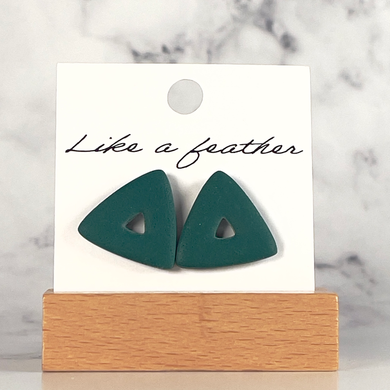 stud earrings shaped like pierced triangle, in turquoise col