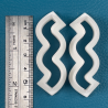 Cutter in the shape of zigzag (50 x 14 mm).