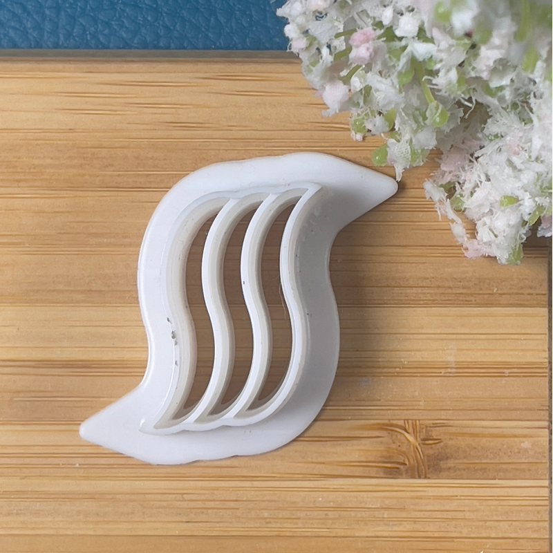 Cutter in form van golven (28 x 25 mm).