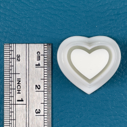 Emporte-pièce en forme de coeur (15 x 17 mm).