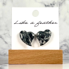dangling earrings shaped like heart, in black, white, silver