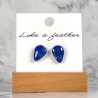 stud earrings shaped like drop, in blue, transparent colors.