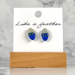 stud earrings shaped like oval, in white, blue colors.