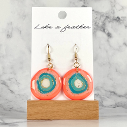 dangling earrings shaped like circle, in rose, blue, white a