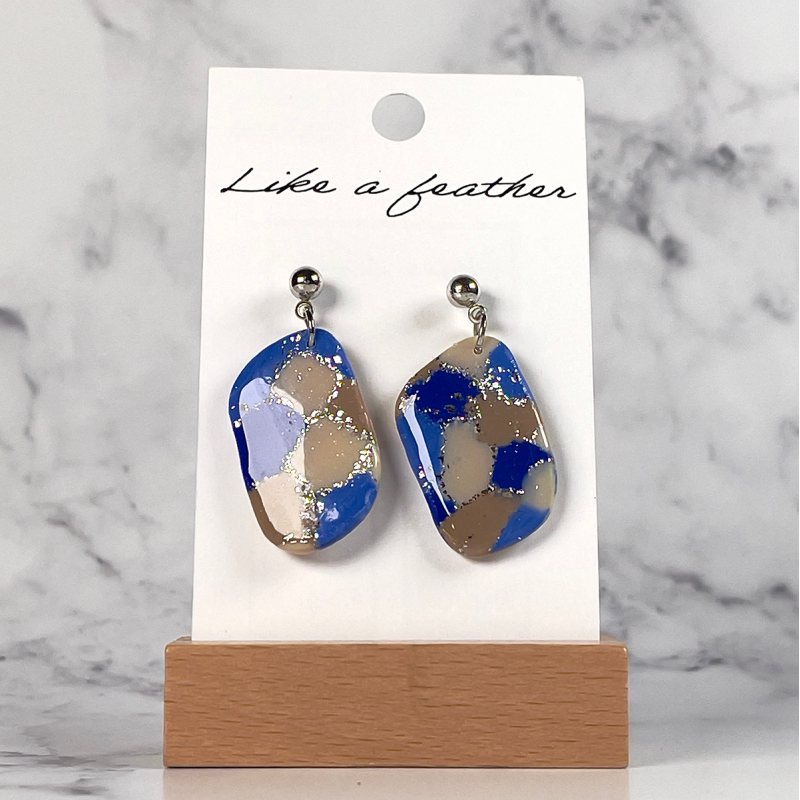 dangling earrings shaped like organic, in blue, sand, beige