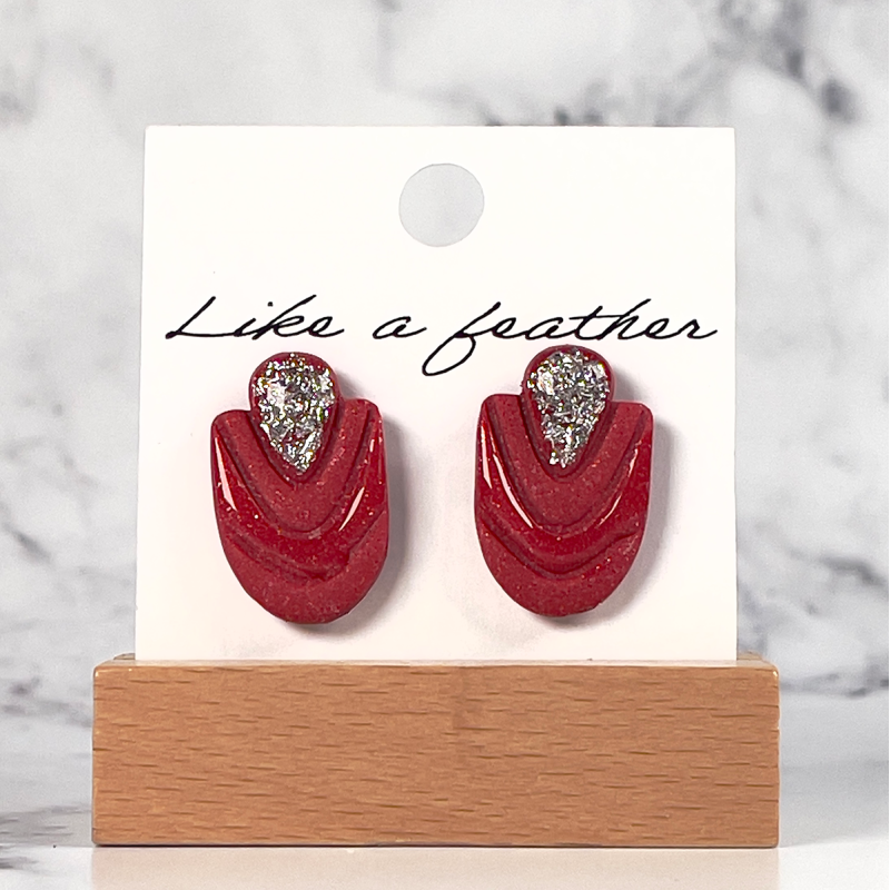 stud earrings shaped like half-oval with drop, in brick red,