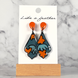 dangling earrings shaped like inverted amphora, in teal blue