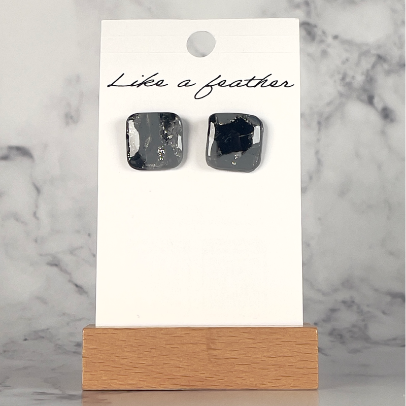 stud earrings shaped like square, in grey, black color.