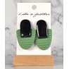 stud earrings shaped like half-oval and oval, in black, moss