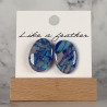 stud earrings shaped like oval, in blue, pale pink, purple a