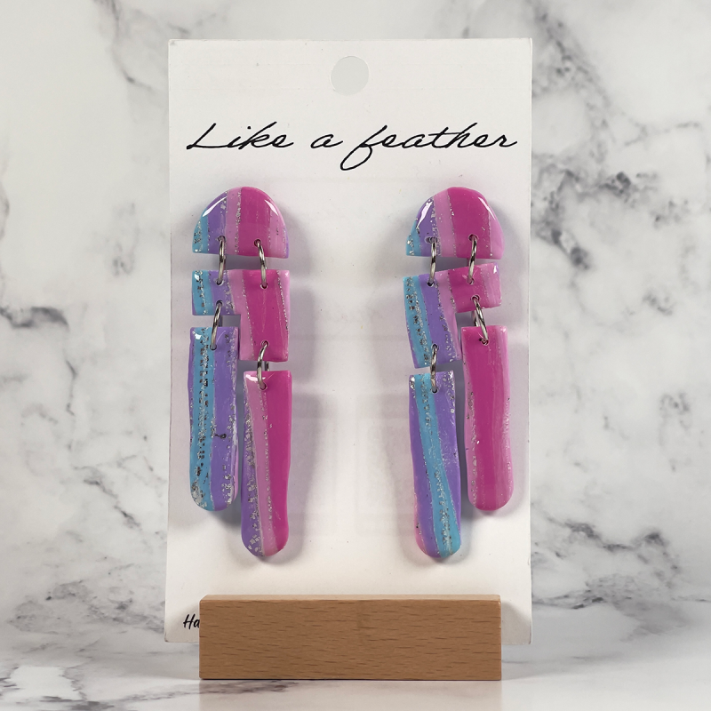 dangling earrings, in blue, fuchsia, rose color.