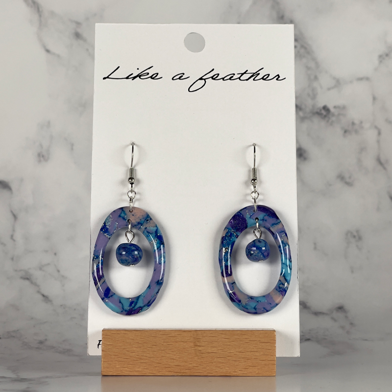 dangling earrings shaped like oval, in blue, purple, pale pi